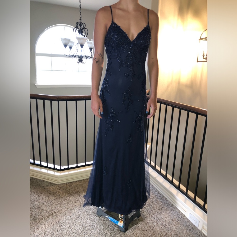 Size 6 Faviana’s dress from Atatiana’s